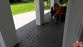 girlfriend and guy have intimate moment on porch