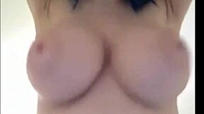 Blue-haired teen with huge breasts chats casually