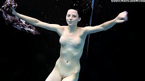 Two sexy Czech brunettes swim naked in pool together