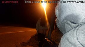 young woman shows her ass to a stranger at the bus stop