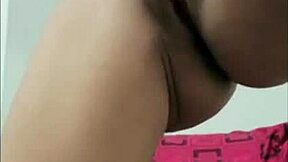 I watch this sluty teen 18+ fingering her big tits and ass on webcam, moaning loudly as she masturbates.