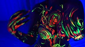 Redhead Amelia Strokes Herself with Body Paint While Music Plays