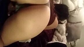 My girlfriend chills in her thong, showing off her big ass