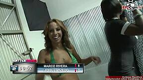 Is this curvy ebony slut winning the contest with her big natural tits in interracial sex?