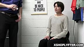 Angeline Red hides in the security office after stealing goods, with Wrex hunting her down.