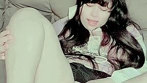 A curious girl explores self-pleasure with a bunny toy, feeling relaxed and intrigued.