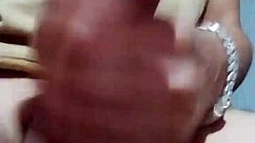 I'm masturbating in the bathroom at my job, feeling horny and reaching orgasm with my cock