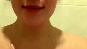 Ritafox, that adorable redhead Russian, washing her gorgeous tits and pussy up close.