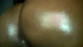ebony teen oils up her ass and fingers her wet pussy on webcam
