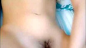 Look at this cute young Asian beauty masturbating.