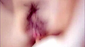 Look at this cute young Asian beauty masturbating.