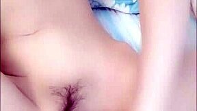 Look at this cute young Asian beauty masturbating.