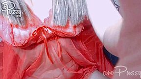 Amateur girl in see-through lingerie indulges in solo shaved pussy play at home