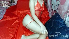 Amateur girl in see-through lingerie indulges in solo shaved pussy play at home