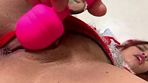 Naughty big boobed babe does naughty things with Santa's helper