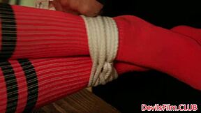 Tattooed babe bound tight while her pussy gets pounded