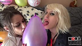 Watch these sexy teens pop balloons and kiss passionately!