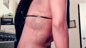 Petite ebony beauty dances seductively to vintage tunes