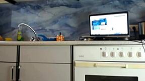 Sexy MILF showing off her ass in the kitchen