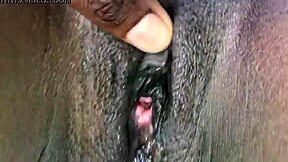 Man, I'm fingering this wet ebony pussy until she’s soaked!
