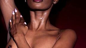 skinny ebony babe alicia hints at her black pussy in the bath