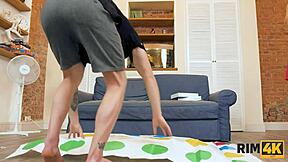 Couple's twister game leads to rimming sex