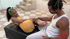 The teen drives the bodybuilder wild with her foot fetish, making him moan in ecstasy.