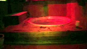 coed at party in dorm gets attention from group.