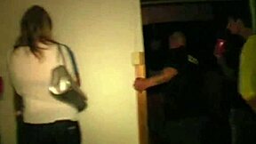 coed at party in dorm gets attention from group.