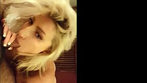 Sexy blonde teen with big tits shows off her boobs in detail