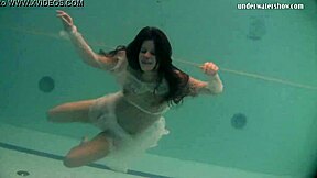 russian naked babe swims and strips in pool