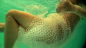 russian naked babe swims and strips in pool