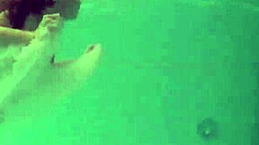 russian naked babe swims and strips in pool