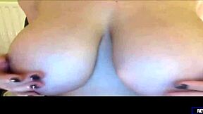 Latina teen boldly shows huge natural tits on webcam