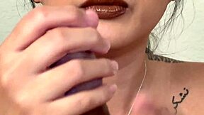 In a close up, an asian woman interacts intimately with a big black cock in an interracial scene