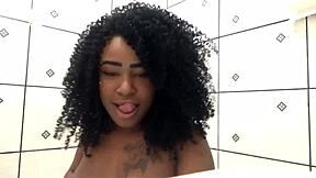 ebony teen reaches orgasm in the shower, playing with her ass and cum