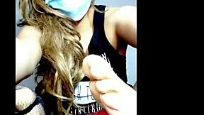 Watch this young girl give a footjob massage