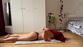 Girl demonstrates flexible naked yoga poses with her fit natural body