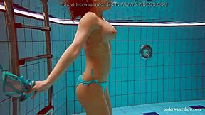 Is Deniska, the Big Tits Petite Babe, Swimming in the Pool for Underwater Fun?