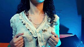 big natural tits girl casually plays with her nipples in the bedroom