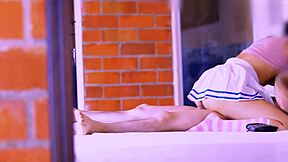 Intense friend comforts shy stepdaughter in cozy room