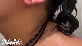 I caught the young girl taking a bath in the shower.