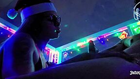 In our sexy Christmas, she gives a sloppy blowjob and gets a facial cumshot as a gift