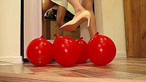 Those heels just keep crushing balloons with style.