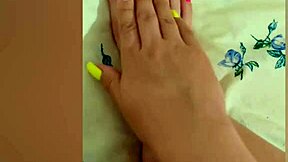 young babe stroking her sexy feet with pink pedicure?