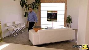 Petite redhead teen explores daddy's powerful cock in amateur scene.