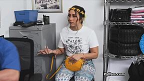 Curvy suspect interacts with guard in shoplifting scenario.