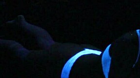 Scarlett Johnson enjoys some blacklight sex in this main scene