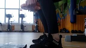 In the gym, a young british female shakes her ass seductively