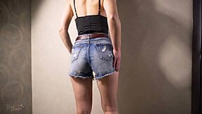 Teen amateur teases tight ass in snug jeans shorts